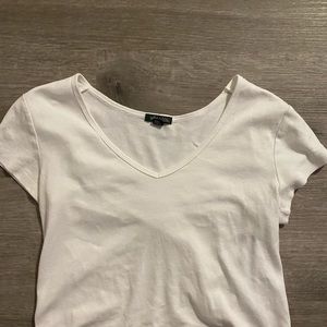 White V-neck top